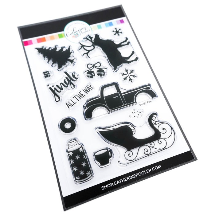 Catherine Pooler - Stamp Set - Sleigh Ride. What could be better then a ride through the snow? With the Sleigh Ride Stamp Set you can ride through the snow in the back of reindeer drawn sleigh and pull your tree from the forest on the back of your pickup truck. Don't forget you thermos of hot cocoa while out in the snow enjoying your day! Available at Embellish Away located in Bowmanville Ontario Canada.
