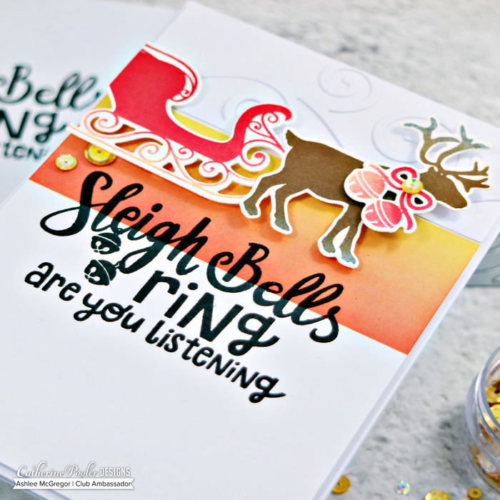 Catherine Pooler - Stamp Set - Sleigh Ride. What could be better then a ride through the snow? With the Sleigh Ride Stamp Set you can ride through the snow in the back of reindeer drawn sleigh and pull your tree from the forest on the back of your pickup truck. Don't forget you thermos of hot cocoa while out in the snow enjoying your day! Available at Embellish Away located in Bowmanville Ontario Canada. Card made by Ashlee McGregor.
