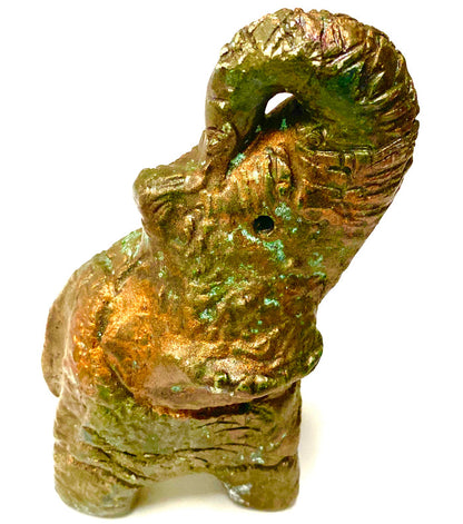 Raku Elephant Have you HERD!!!!!!  Just one of these lovely Raku Fired Elephant will make an excellent gift for your  friend, sorority or for your home’ special place centerpiece.  5" x 2" x 3" 1lbs Beautiful metallic raku elephant For decorative purposely only.