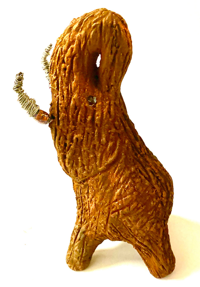 Raku Elephant Have you HERD!!!!!!  Just one of these lovely Raku Fired Elephant will make an excellent gift for your  friend, sorority or for your home’ special place centerpiece.   6" x 3" x 4" 10.9  ozs. Beautiful metallic and red rust raku elephant For decorative purposely only
