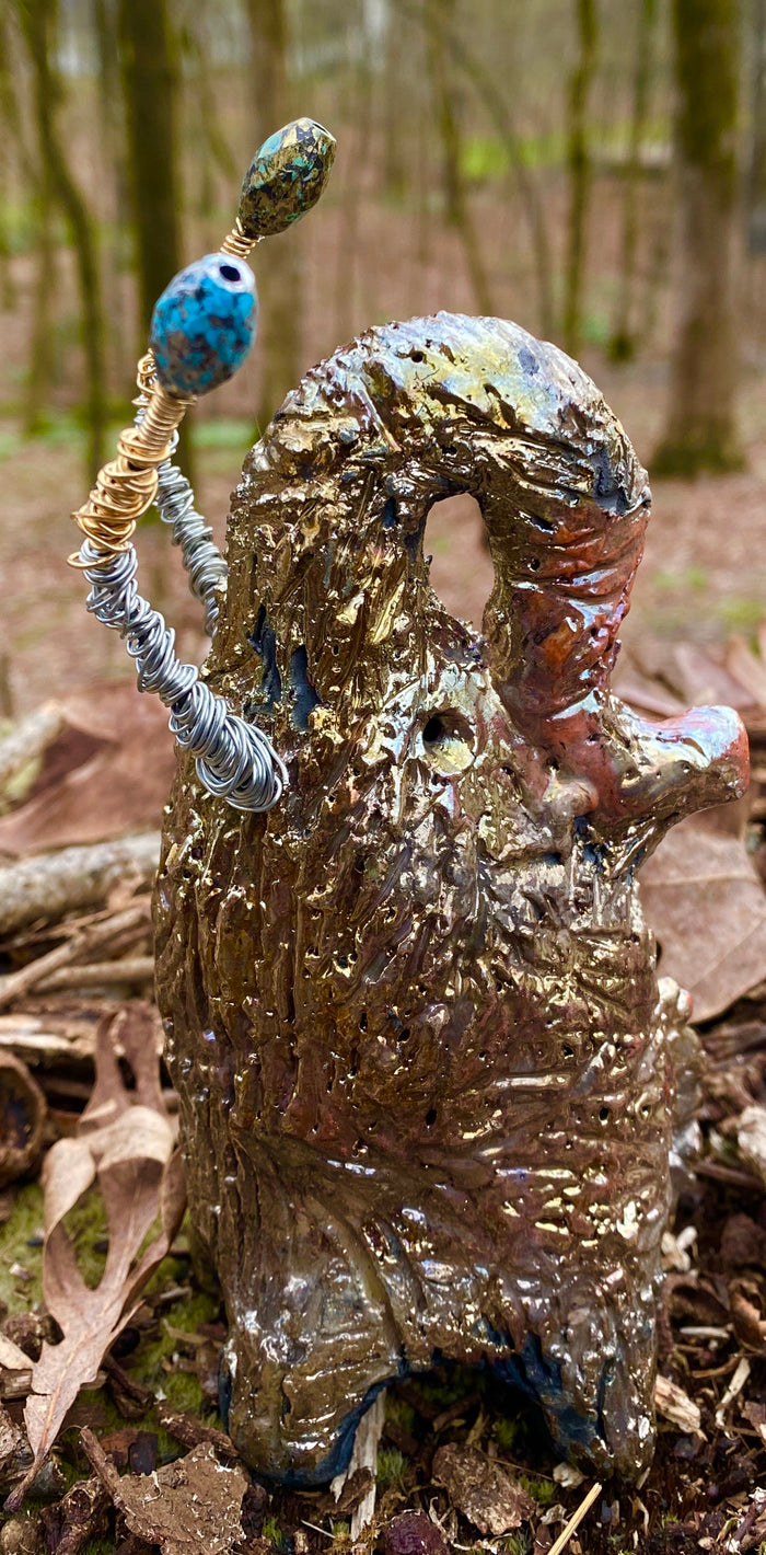 Raku Elephant Have you HERD!!!!!!  Just one of these lovely Raku Fired Elephant will make an excellent gift for your  friend, sorority or for your home’ special place centerpiece.   6.5" x 3" x 4" 10 ozs Silver and gold beaded tusk Beautiful  gold metallic raku elephant For decorative purposely only