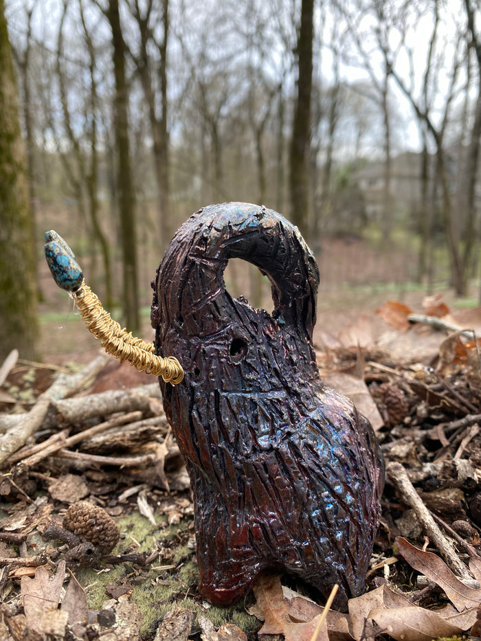 Raku Elephant Have you HERD!!!!!!  Just one of these lovely Raku Fired Elephant will make an excellent gift for your  friend, sorority or for your home’ special place centerpiece.  7" x 4" x 3" 11 ozs. Beautiful metallic gold and orange raku elephant For decorative purposely only.