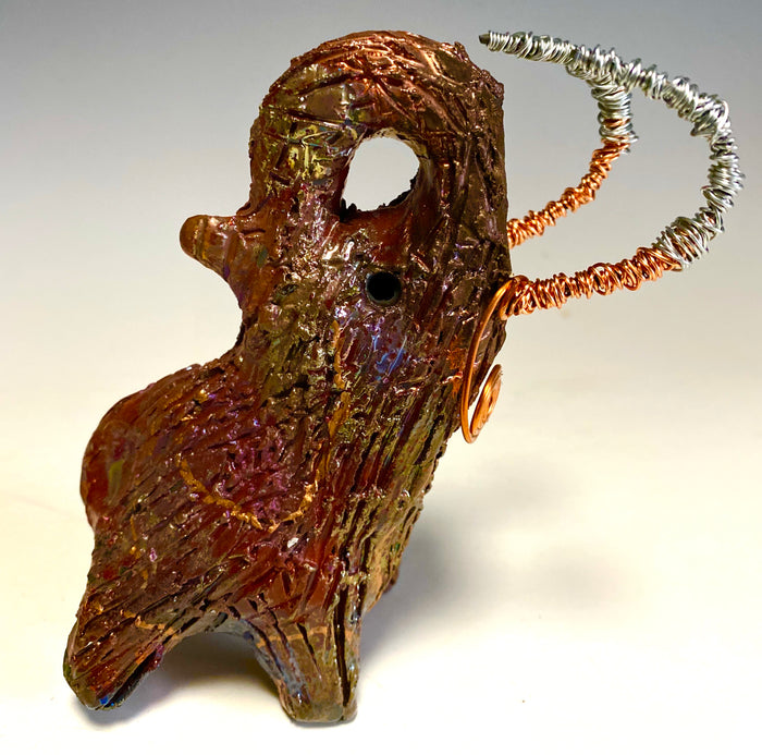 Raku Elephant Have you HERD!!!!!!  Just one of these lovely Raku Fired Elephant will make an excellent gift for your  friend, sorority or for your home’ special place centerpiece.  6" x 4" x 5" 10 ozs. Beautiful copper metallic  raku elephant Copper and silver tusk For decorative purposely only.