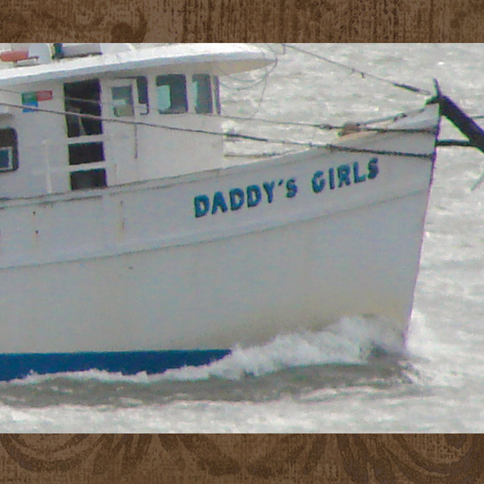 zooming in to read the name of the boat!