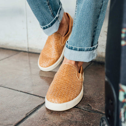 OluKai Lae'Ahi Lauhala tan leather slip-on shoes with woven lauhala pattern and white soles