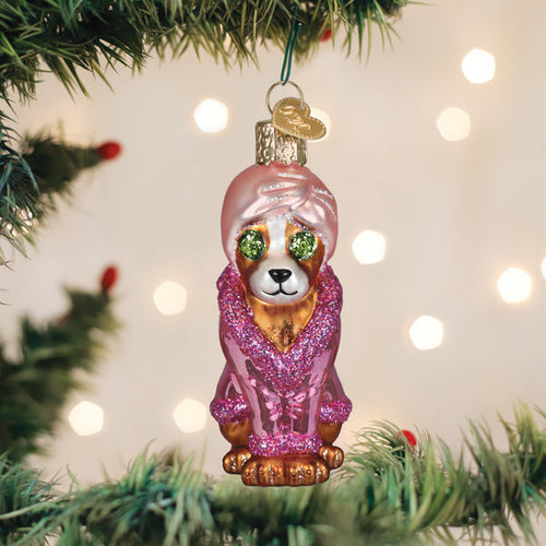 Spa dog glass ornament of a puppy in a pink towel with cucumber eyes