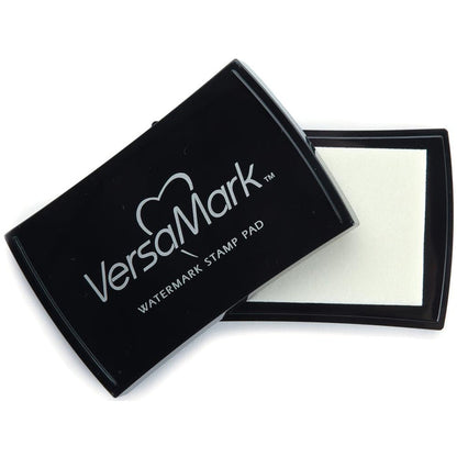 Imagine - VersaMark - Watermark Stamp Pad. VERSAMARK-Watermark Inkpad by Tsukineko contains clear watermark ink. You will not believe what you can do with just one ink pad! A necessity for every crafter. Easy for beginning stampers to use, but versatile enough for experienced stamp artists to create unparalleled masterpieces. Available at Embellish Away located in Bowmanville Ontario Canada.